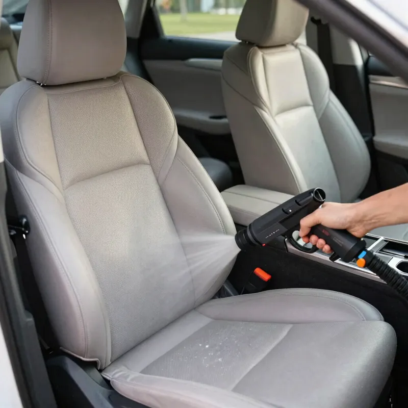 Nettoyage d'un siège de voiture par injection-extraction
